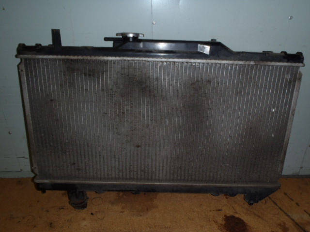 Chladič Carina E 1.6i