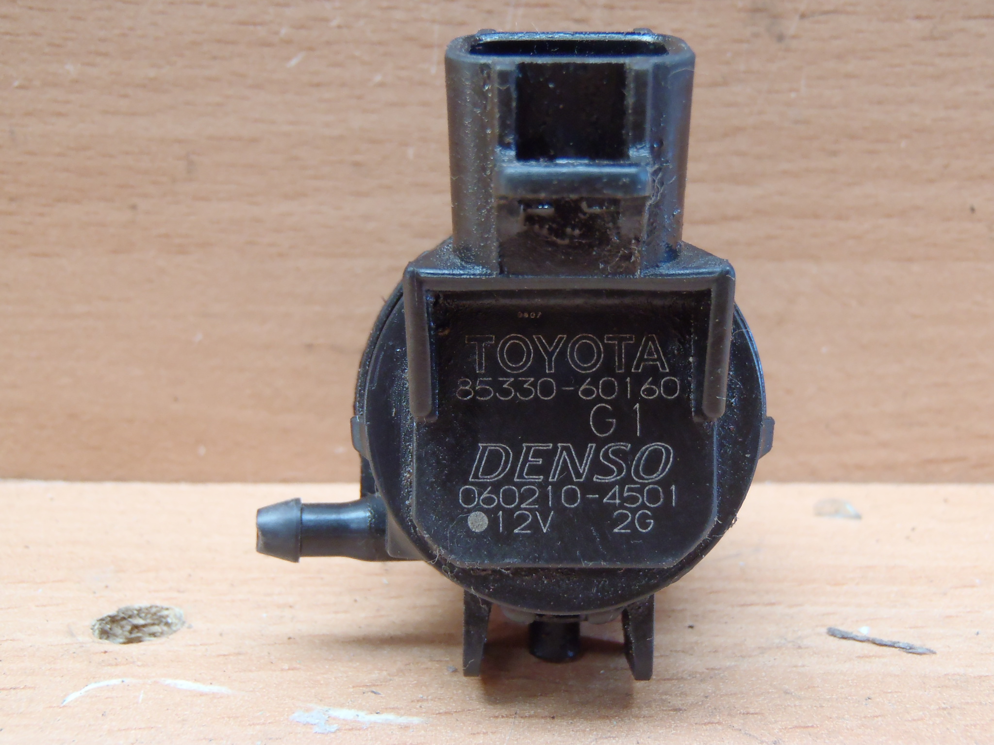 Motorek ostřikovače