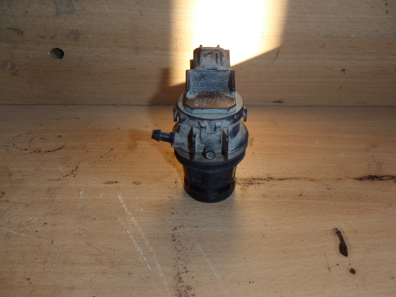 Motorek ostřikovače