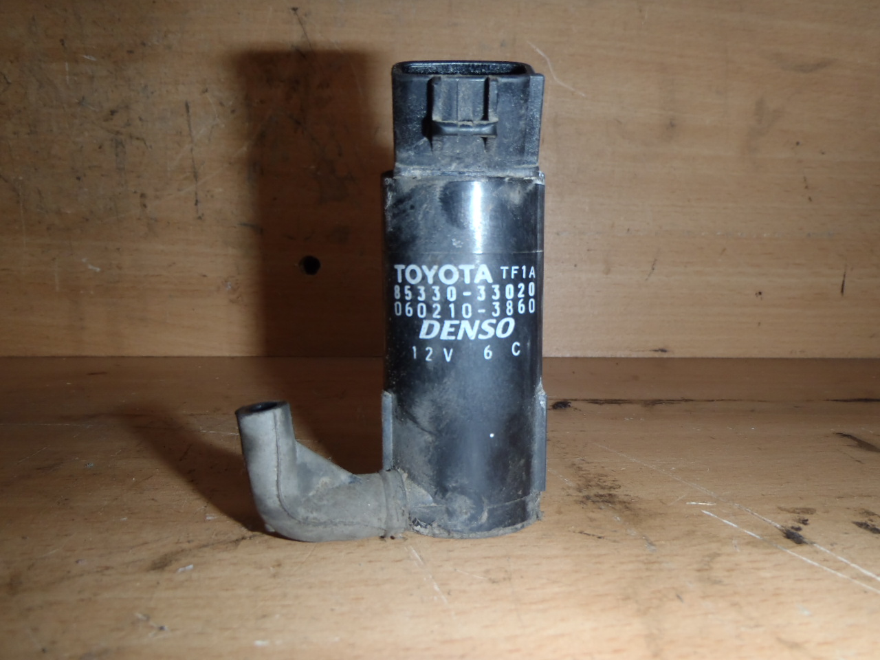 Motorek ostřikovače 1