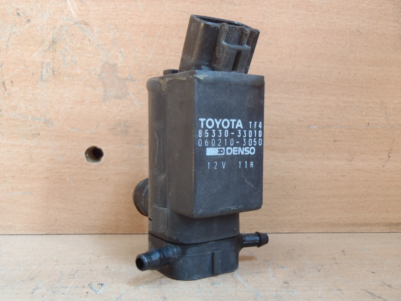 Motorek ostřikovače