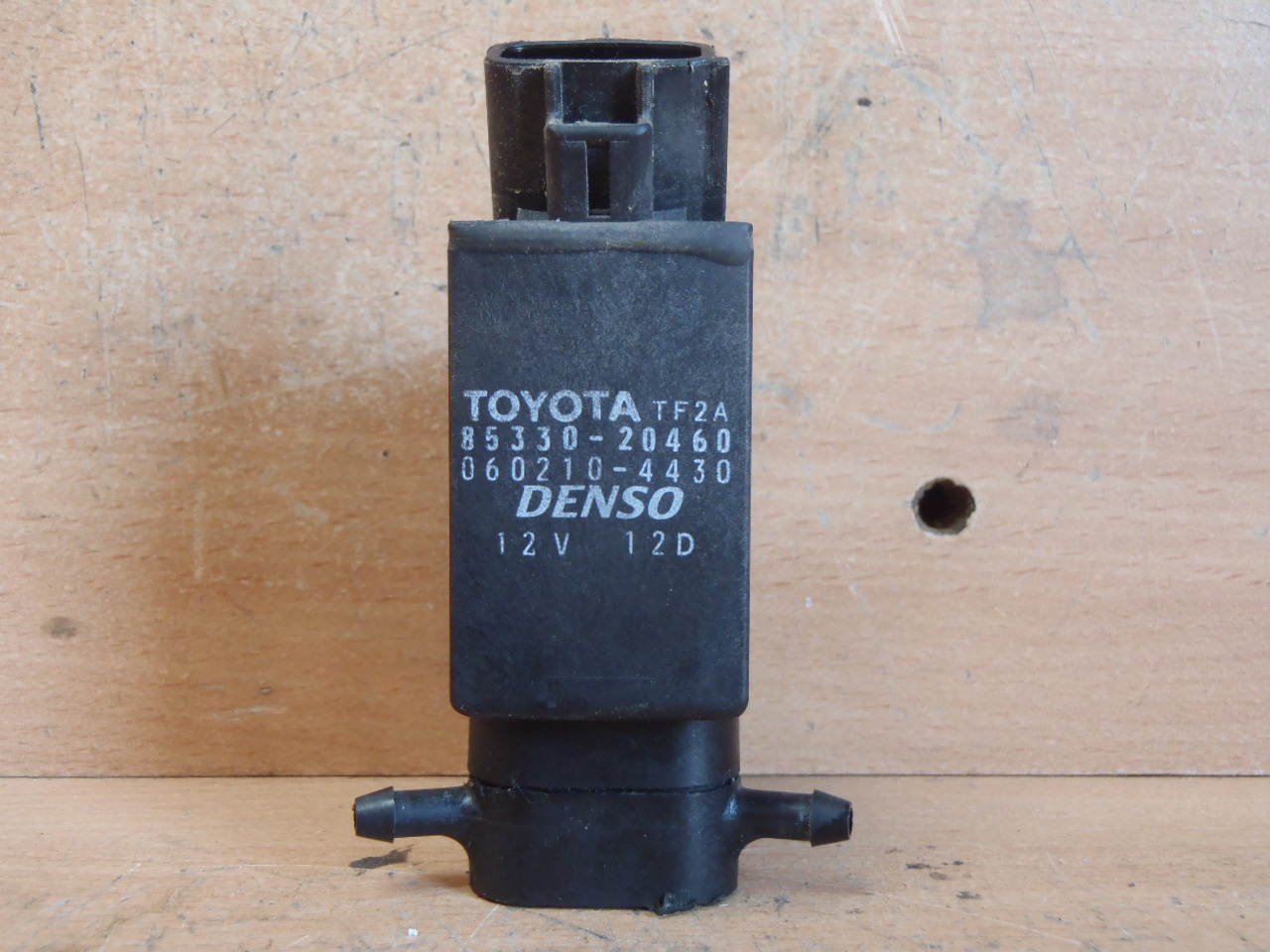 Motorek ostřikovače