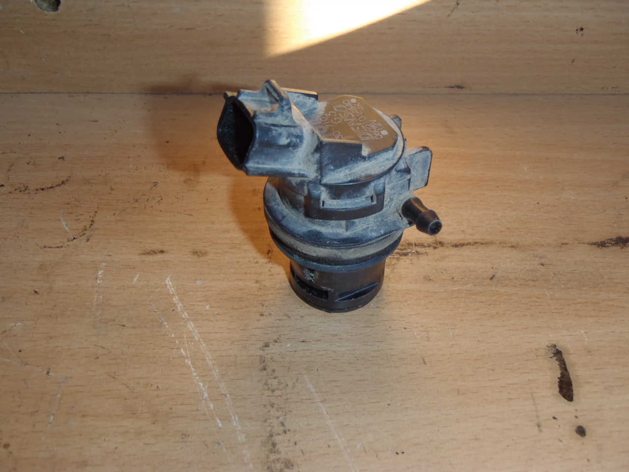 Motorek ostřikovače