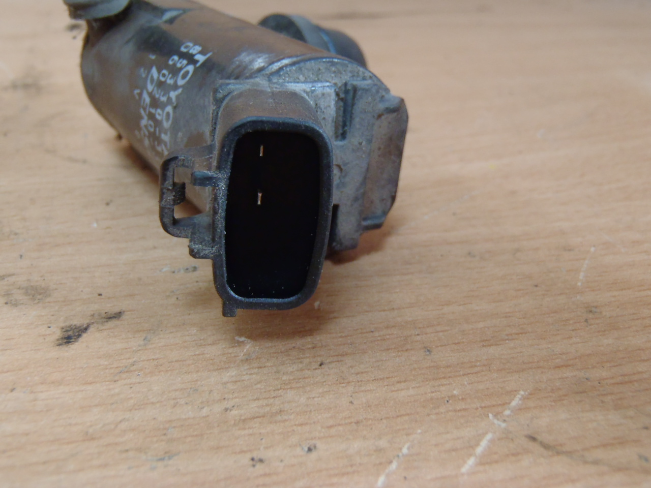 Motorek ostřikovače 1