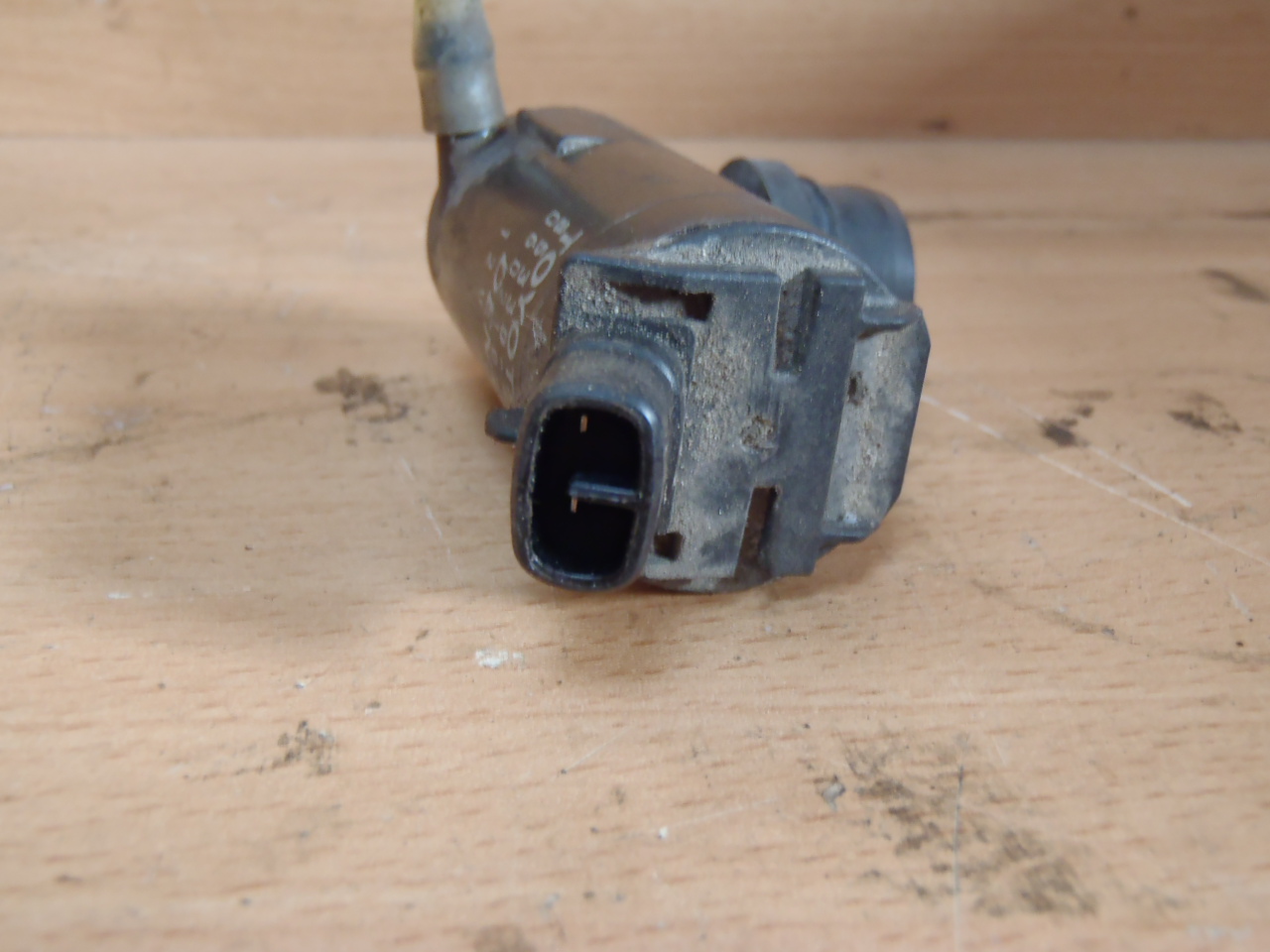 Motorek ostřikovače 2