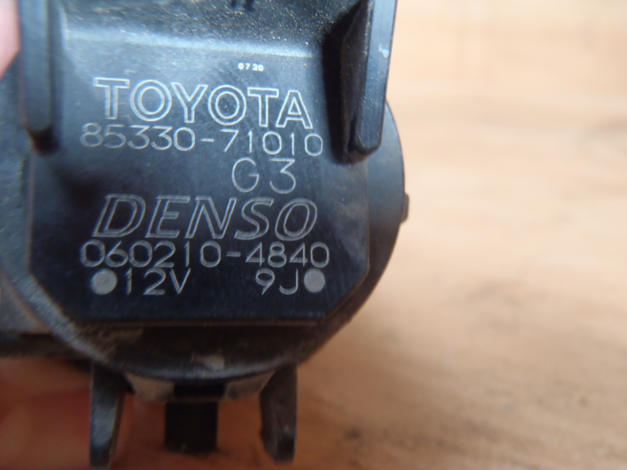 Motorek ostřikovače