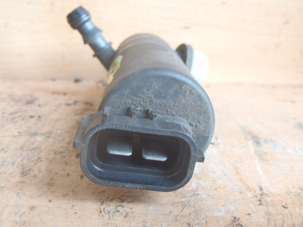 Motorek ostřiku xenonů